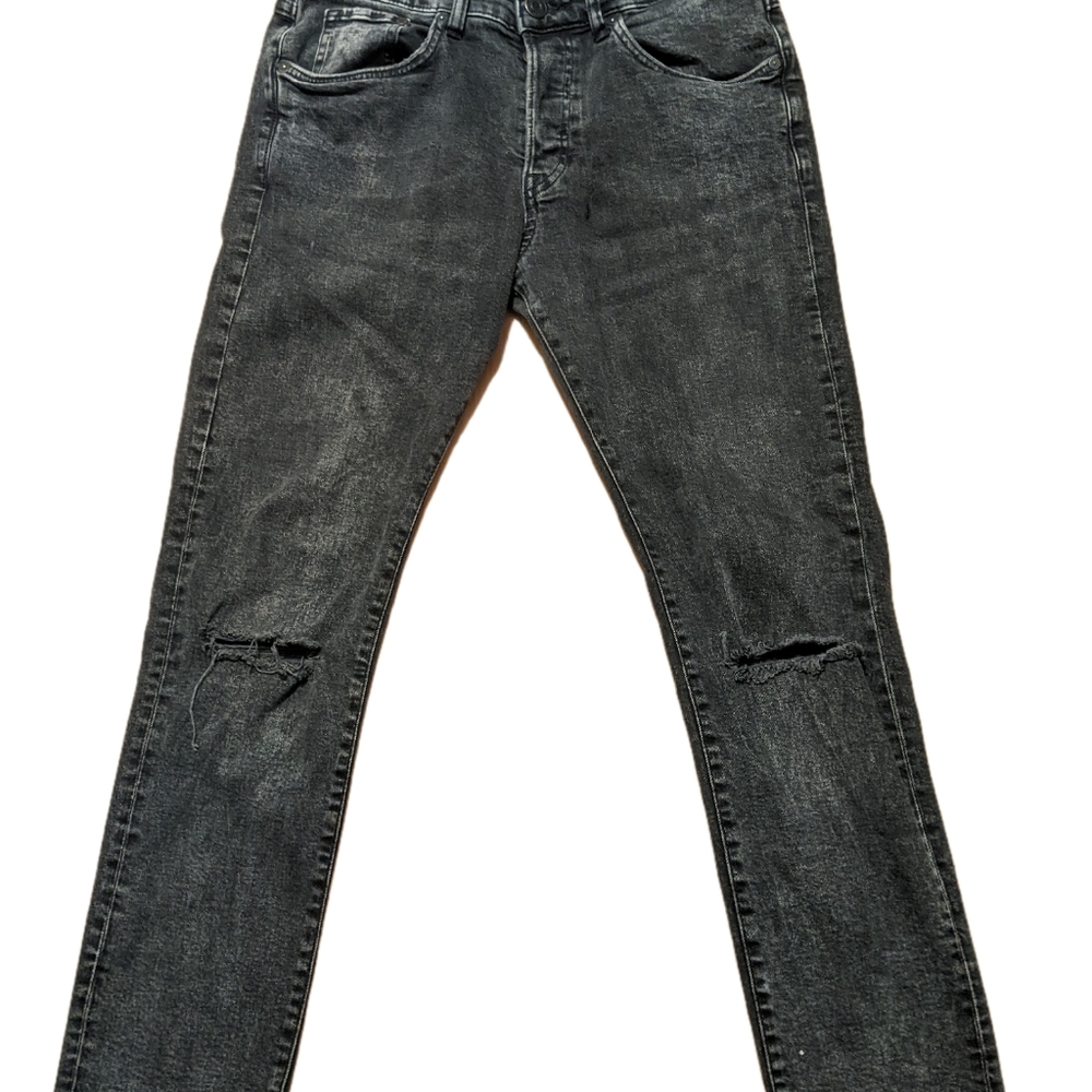Acid washed ripped jeans